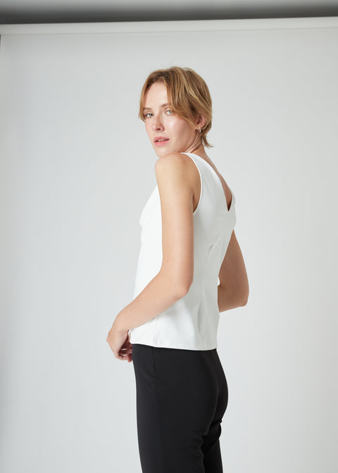 Tailored darts meet a clean V-back for a fit that feels made for you.