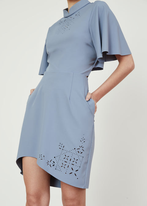 Close up of ACOT Laser Motif Short Skirt in Powder Blue with Pocket by As Intended a Workleisure label