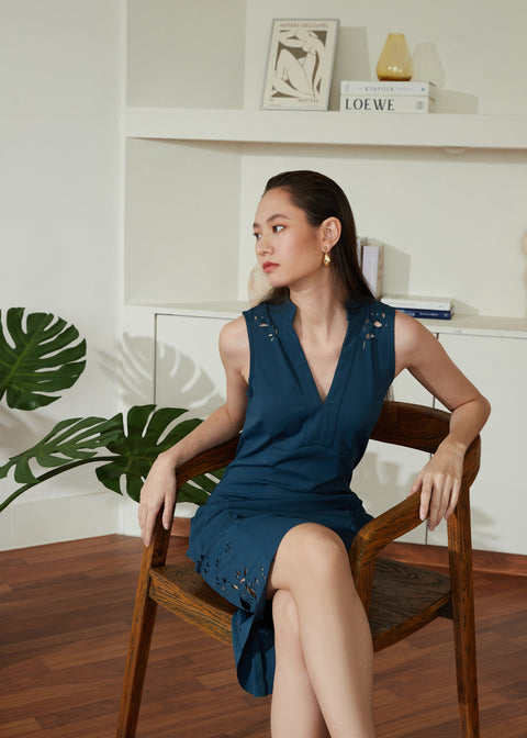 Sitting down in CELO Dress in Peacock Green by As Intended a Workleisure label