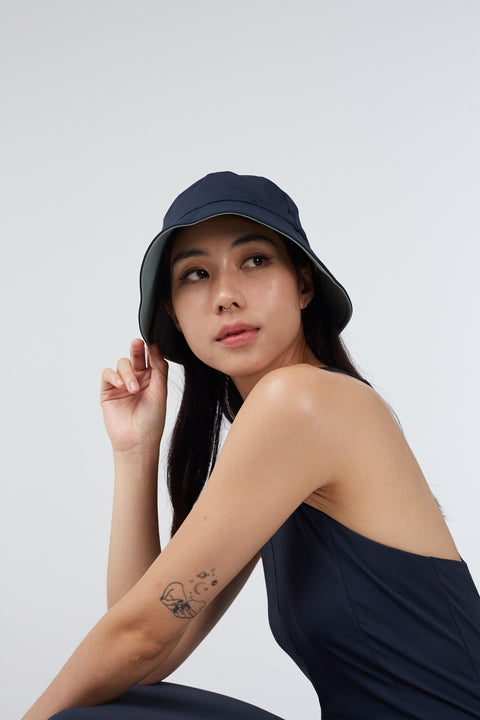 VERS Reversible Bucket Hat in MINT/MIDNIGHT