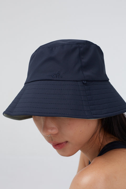 VERS Reversible Bucket Hat in MINT/MIDNIGHT