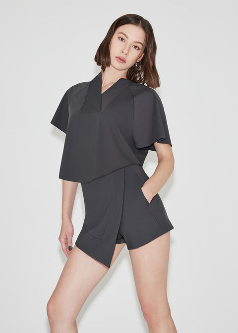 Showcasing pocket by ARCH Skort in Anthracite by As Intended a Workleisure label