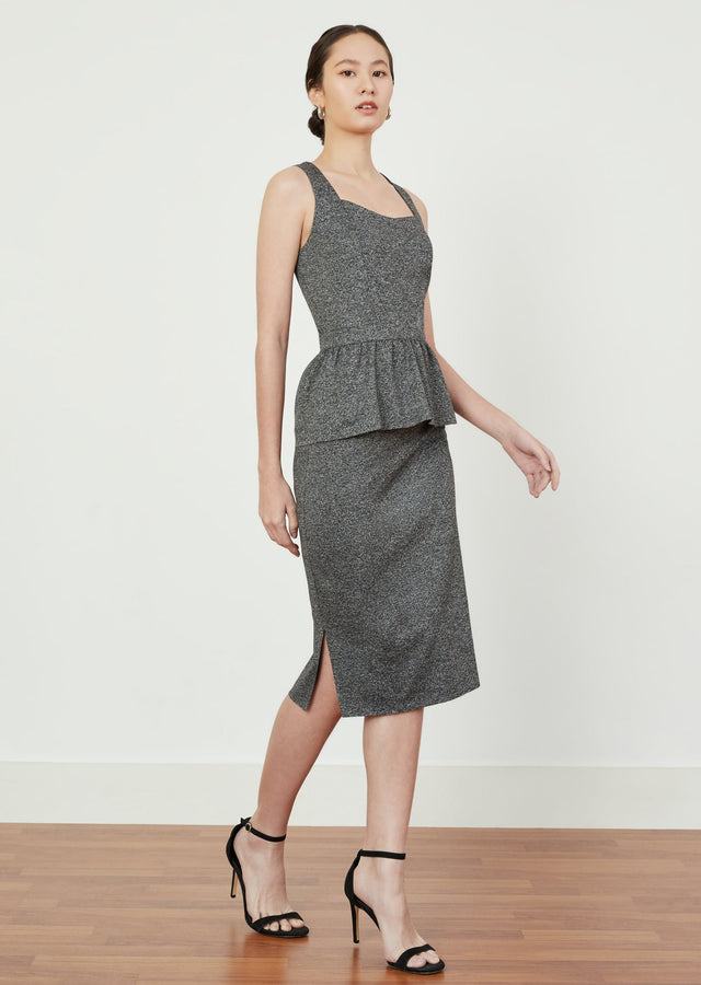 Model walking in AEDA Detachable Peplum Dress in Heather Grey by As Intended a Workleisure label